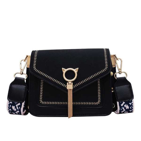 Moderna ženska torba od eko kože s tekstilnom ručkom