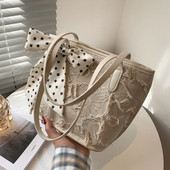 Γυναικεία τσάντα με κορδέλα και φερμουάρ