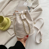 Γυναικεία έκο δερμάτινη τσάντα με πέρλες