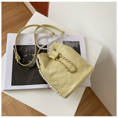 Γυναικεία έκο δερμάτινη τσάντα με πέρλες