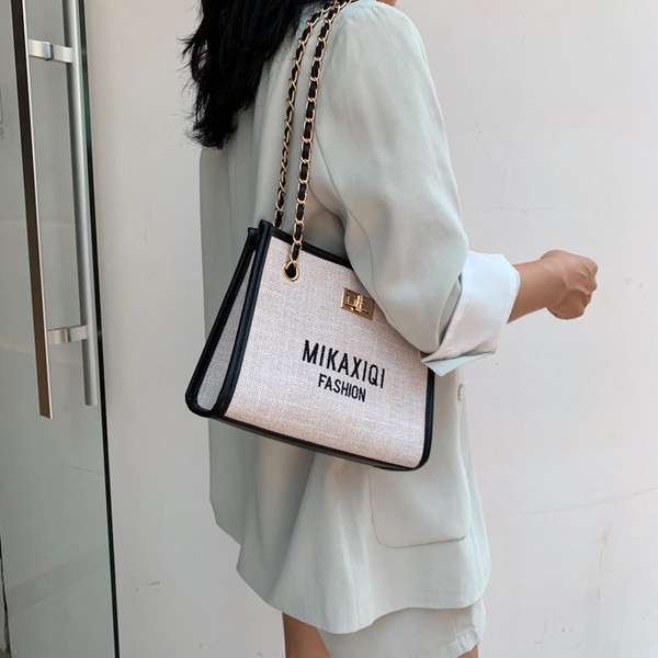 Geantă mică textilă cu inscripții