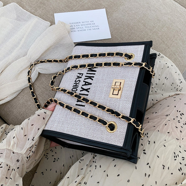 Geantă mică textilă cu inscripții