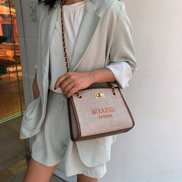 Geantă mică textilă cu inscripții