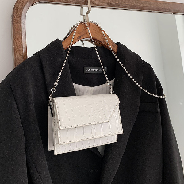 Γυναικεία έκο δερμάτινη τσάντα με αλυσίδα