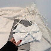 Γυναικεία έκο δερμάτινη τσάντα με κορδέλα και λαβή