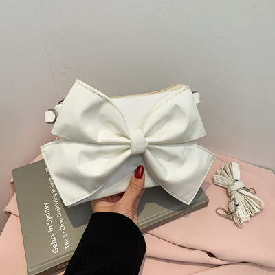 Γυναικεία έκο δερμάτινη τσάντα με κορδέλα και λαβή