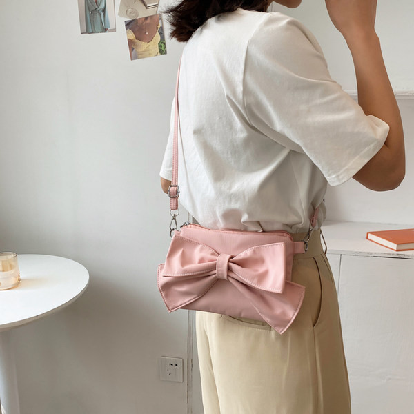 Γυναικεία έκο δερμάτινη τσάντα με κορδέλα και λαβή