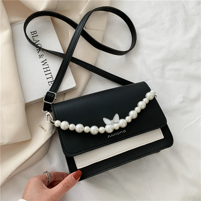 Γυναικεία τσάντα με μαργαριτάρια και μακριά λαβή