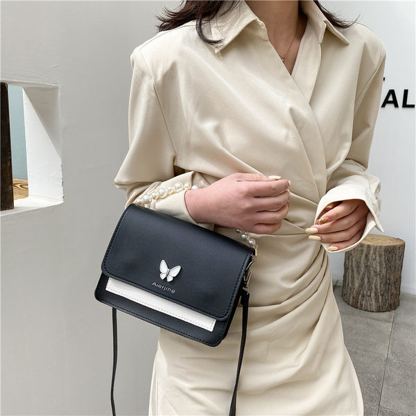 Γυναικεία τσάντα με μαργαριτάρια και μακριά λαβή