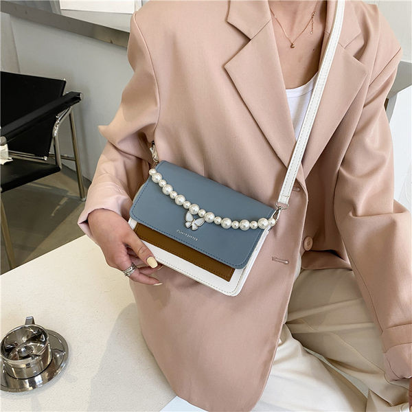 Γυναικεία τσάντα με μαργαριτάρια και μακριά λαβή