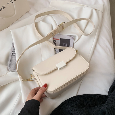 Γυναικεία τσάντα απλό μοντέλο με μακριά λαβή - κατασκευασμένη από οικολογικό δέρμα