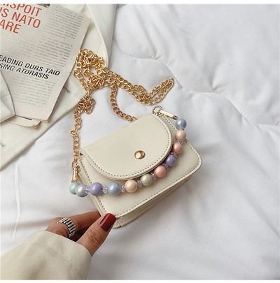 Γυναικεία τσάντα ώμου με πέρλες και μεταλλική μακριά αλυσίδα