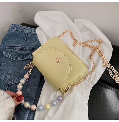 Γυναικεία τσάντα ώμου με πέρλες και μεταλλική μακριά αλυσίδα