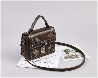 Νέο μοντέλο μοντέρνα έκο δερμάτινη τσάντα με μεταλλικά πούλια