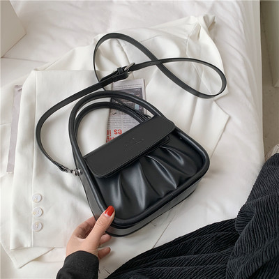 Γυναικεία έκο δερμάτινη τσάντα με δύο κοντές λαβές και μία μακρύ