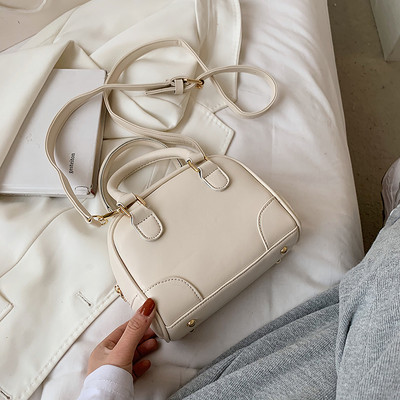 Γυναικεία τσάντα με κοντή και μακριά λαβή από οικολογικό δέρμα