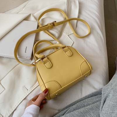 Γυναικεία τσάντα με κοντή και μακριά λαβή από οικολογικό δέρμα