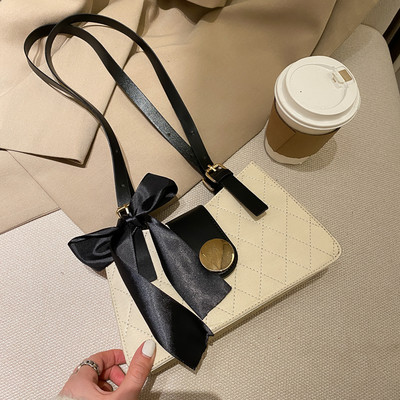 Σύγχρονη γυναικεία τσάντα από οικολογικό δέρμα με σατέν κορδέλα