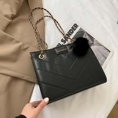 Casual γυναικεία τσάντα από οικολογικό δέρμα με αξεσουάρ