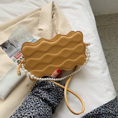 Jauna modeļa sieviešu soma ar pērlēm un garu rokturi