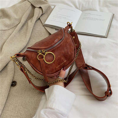 Maza ādas soma ar ādu un metāla rokturi