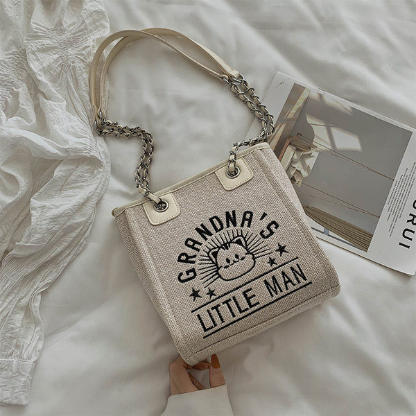 Γυναικεία υφασμάτινη τσάντα με κέντημα