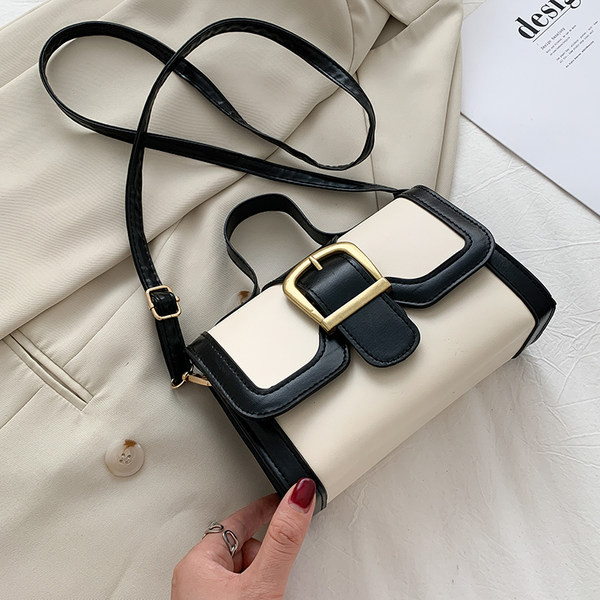 Νέο μντέλο γυναικεία τσάντα μικρό μεγέθος με κοντή και μακριά λαβή και μεταλλική στερέωση