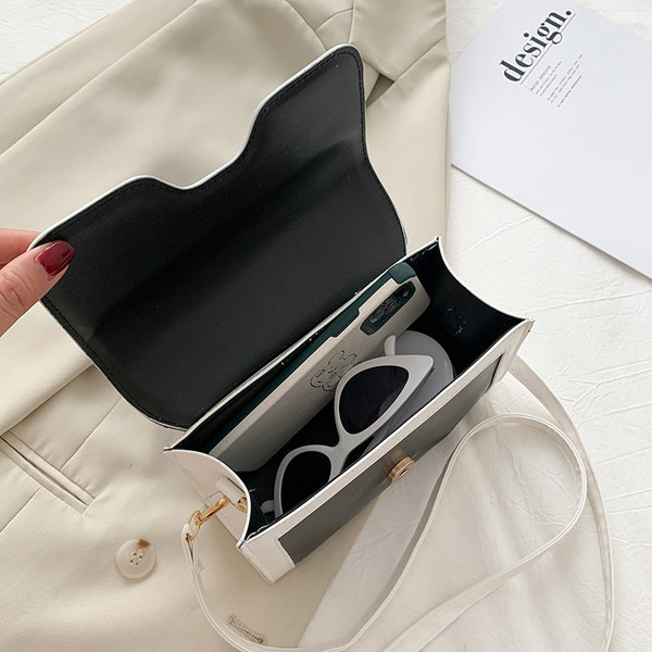 Νέο μντέλο γυναικεία τσάντα μικρό μεγέθος με κοντή και μακριά λαβή και μεταλλική στερέωση