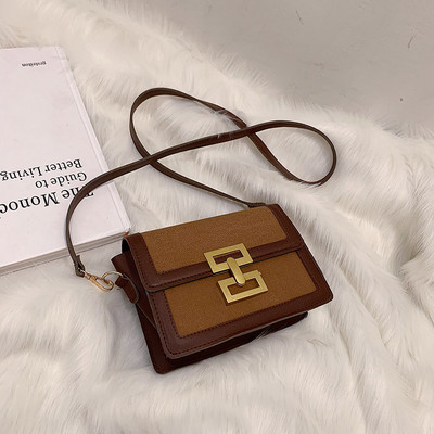 Moderna sieviešu soma ar garu rokturi un metāla aizdari