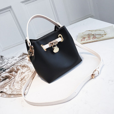 Μικρή δερμάτινη τσάντα νέου μοντέλου με δύο λαβές