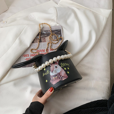 Γυναικεία τσάντα με κορδέλα και χρώμα απλικέ