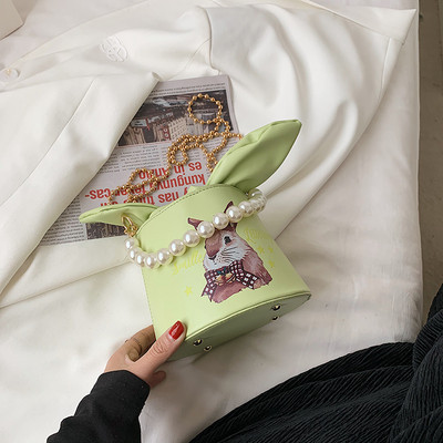 Γυναικεία τσάντα με κορδέλα και χρώμα απλικέ