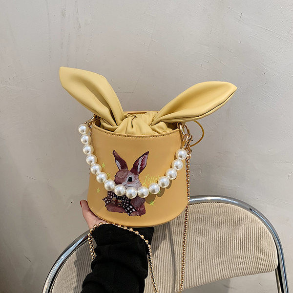 Γυναικεία τσάντα με κορδέλα και χρώμα απλικέ