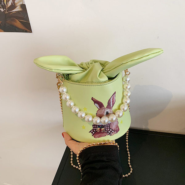 Γυναικεία τσάντα με κορδέλα και χρώμα απλικέ