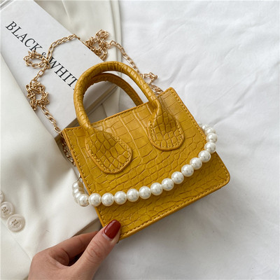 Γυναικεία έκο δερμάτινη τσάντα με πέρλες  σε διάφορα χρώματα