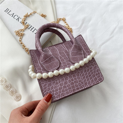 Γυναικεία έκο δερμάτινη τσάντα με πέρλες  σε διάφορα χρώματα