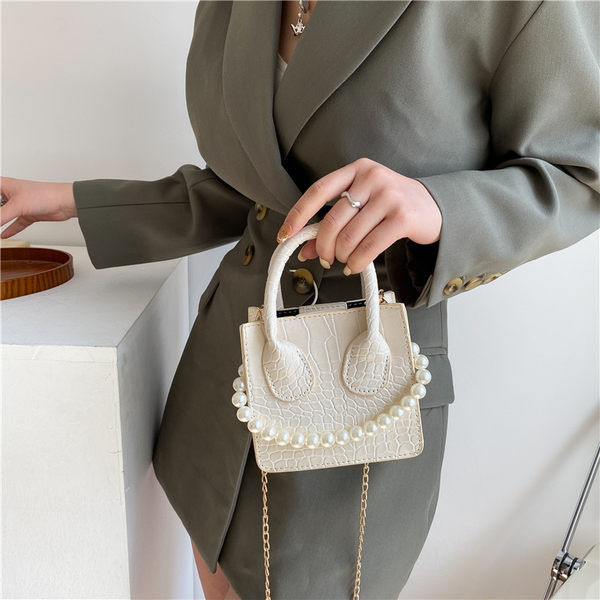 Γυναικεία έκο δερμάτινη τσάντα με πέρλες  σε διάφορα χρώματα