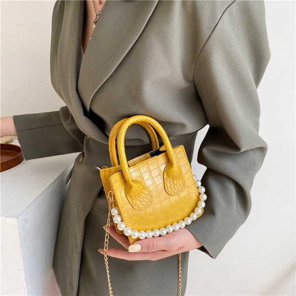 Γυναικεία έκο δερμάτινη τσάντα με πέρλες  σε διάφορα χρώματα