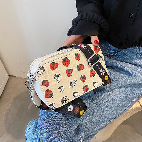 Sieviešu soma ar aplikāciju un tekstila rokturi