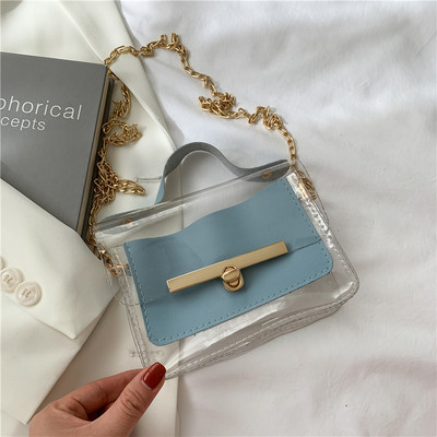 Διαφανής γυναικεία τσάντα με μεταλλική στερέωση