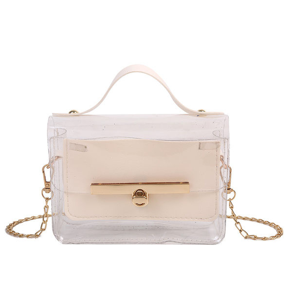 Διαφανής γυναικεία τσάντα με μεταλλική στερέωση