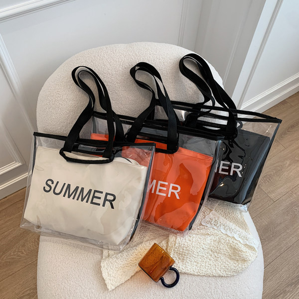 Geantă de mână transparentă cu inscripție și fermoar