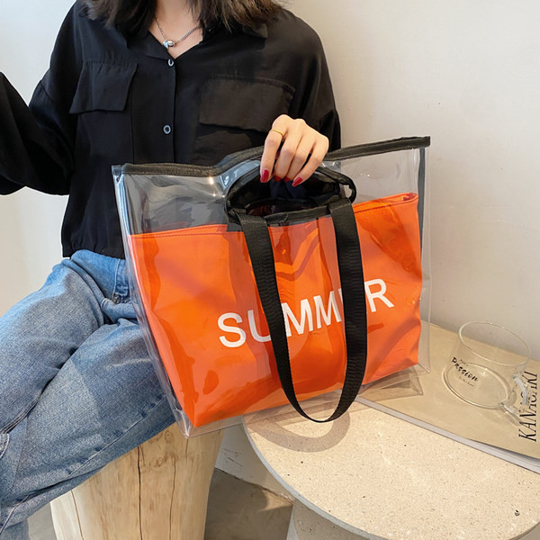 Geantă de mână transparentă cu inscripție și fermoar