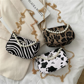 Σύγχρονη γυναικεία τσάντα με πέρλες και κορδέλα