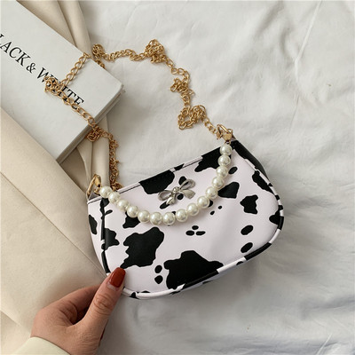 Σύγχρονη γυναικεία τσάντα με πέρλες και κορδέλα