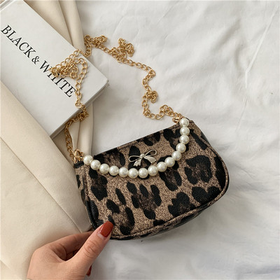 Σύγχρονη γυναικεία τσάντα με πέρλες και κορδέλα