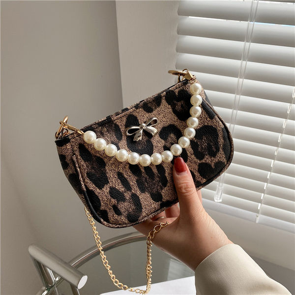Σύγχρονη γυναικεία τσάντα με πέρλες και κορδέλα