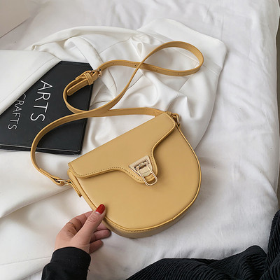 Γυναικεία τσάντα έκο δερμάτινη και μεταλλικό κούμπωμα