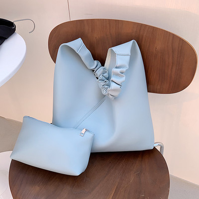 Γυναικεία τσάντα μονόχρωμη από οικολογικό δέρμα σε διάφορα χρώματα