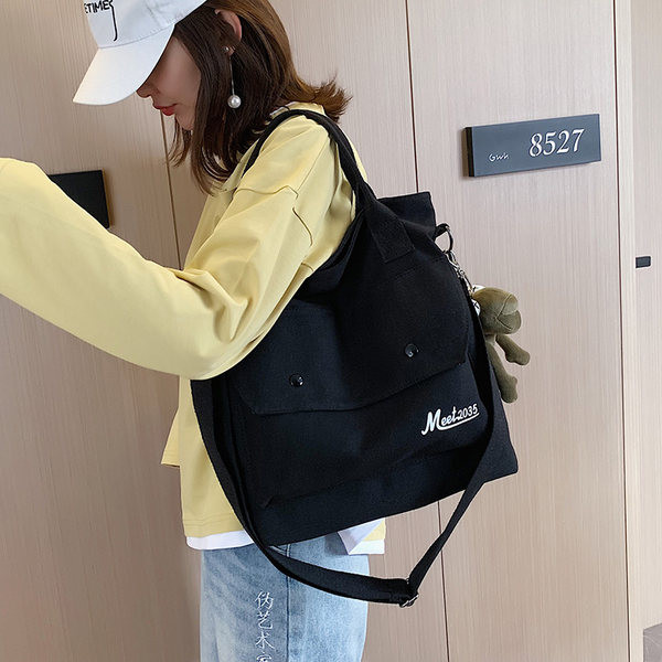 Μεγάλη υφασμάτινη τσάντα με τσέπη